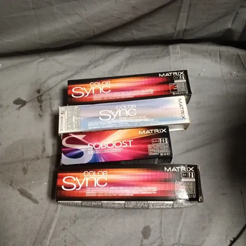 BOX OF APPROXIMATELY 60 HAIR CARE PRODUCTS INCLUDING MATRIX COLOR SYNC MAGENTA/VIOLET/BRUNETTE AND SOBOOST YELLOW