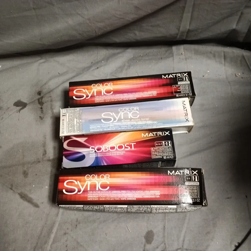 BOX OF APPROXIMATELY 60 HAIR CARE PRODUCTS INCLUDING MATRIX COLOR SYNC MAGENTA/VIOLET/BRUNETTE AND SOBOOST YELLOW