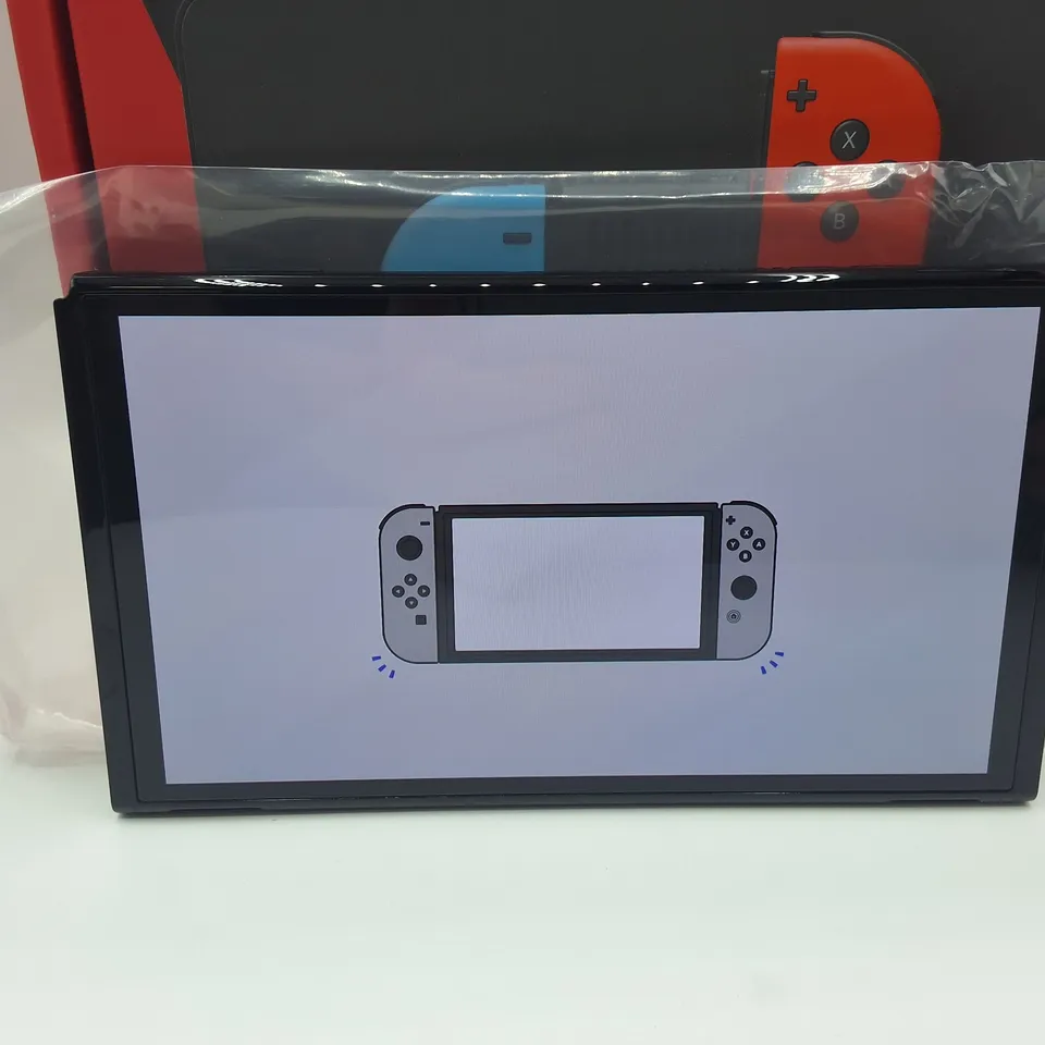 BOXED NINTENDO SWITCH OLED HANDHELD GAMES CONSOLE WITH ACCESSORIES