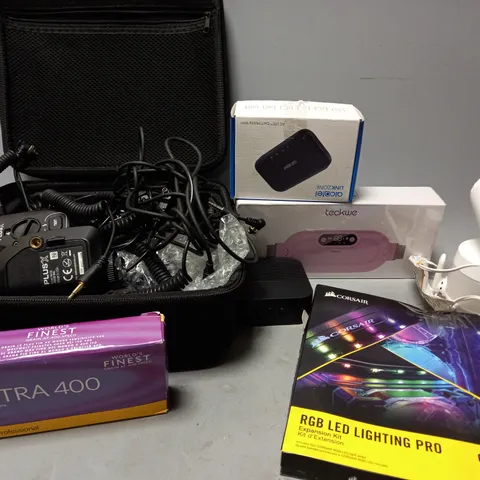 APPROXIMATELY 7 ASSORTED ELECTRICAL ITEMS TO INCLUDE ALCATEL LINKZONE, VTECH CAMERA, CORSAIR RGB LED LIGHTING PRO, ETC