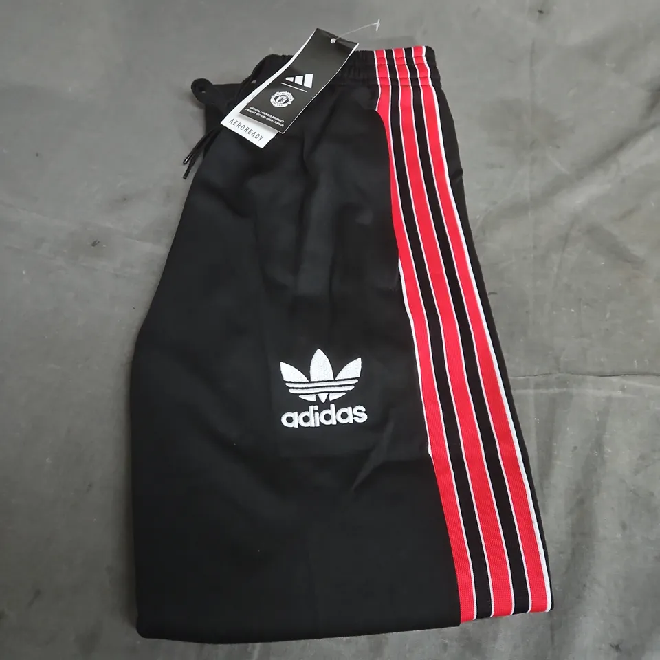 ADIDAS MANCHESTER UNITED TRACK PANTS – SIZE 14