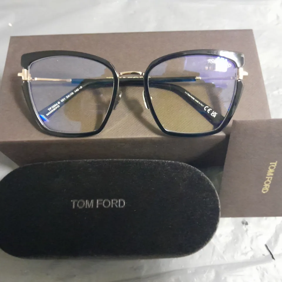 BOXED PAIR OF TOM FORD BLACK AND GOLD GLASSES