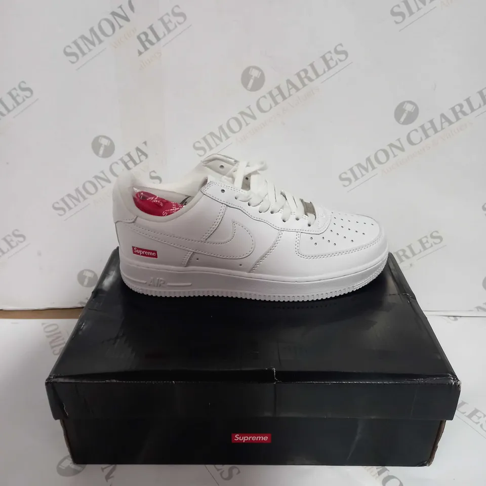 BOXED PAIR OF SUPREME/NIKE WHITE AIR FORCE ONES SIZE 6