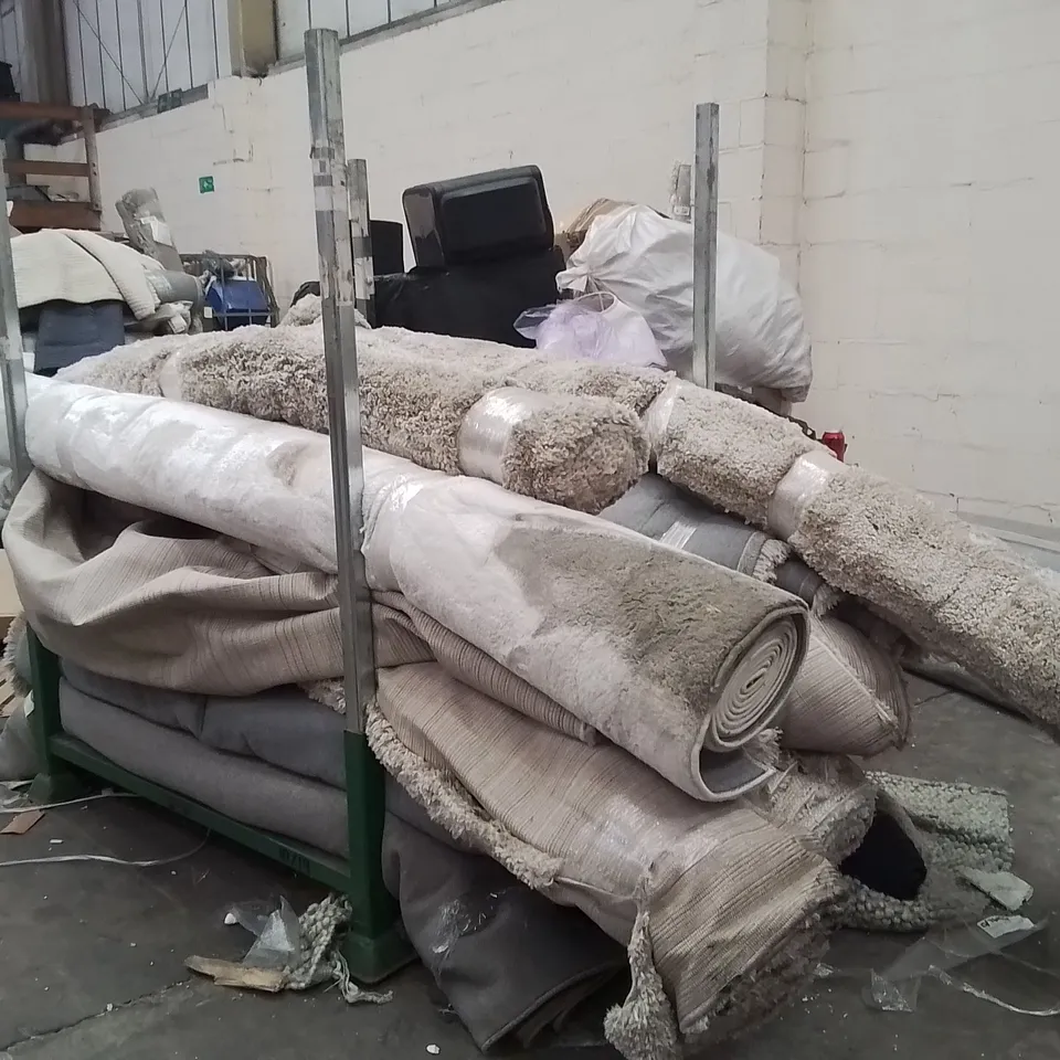 STILLAGE OF APPROXIMATELY 17 XL QUALITY DESIGNER RUGS