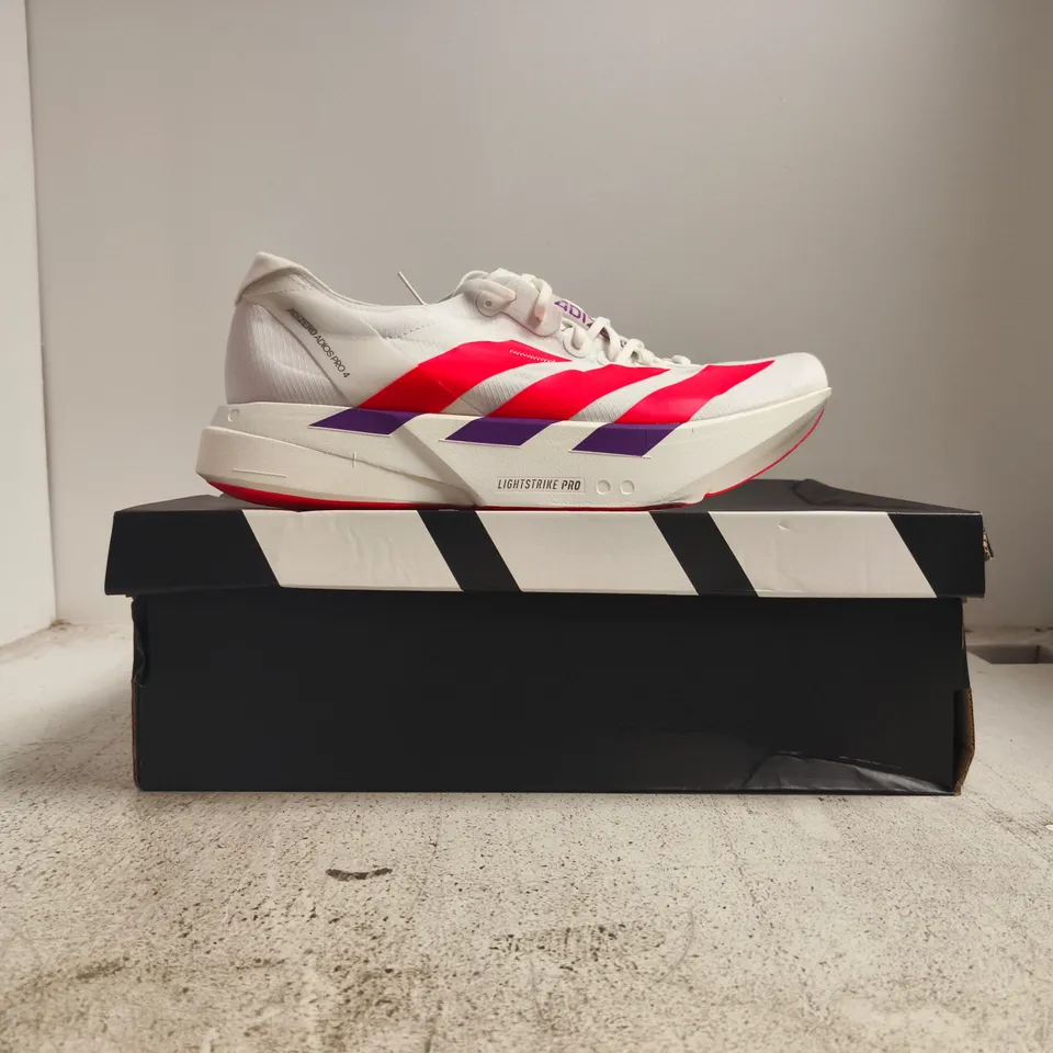 BOXED PAIR OF ADIDAS ADIZERO ADIOS PRO 4 TRAINERS IN WHITE/RED/PURPLE SIZE UK 12