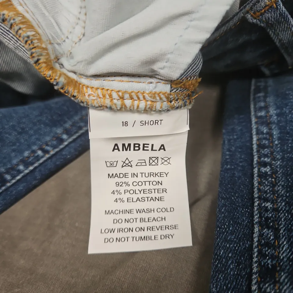 AMBELA DENIM JEANS – UK 18 SHORT, MID-BLUE WASH, LEATHER PATCH