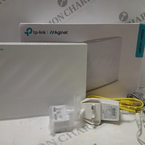 TP LINK AGINET VX230V AX1800 DUAL BOND MODEM ROUTER