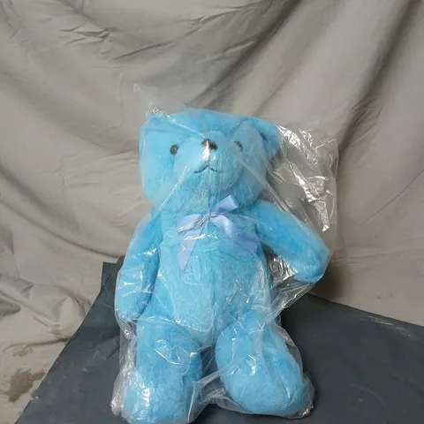 BLUE PLUSH TEDDY BEAR WITH RIBBON – IN CLEAR PACKAGING