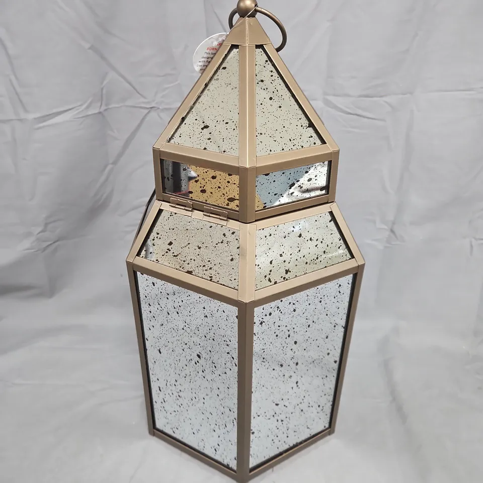 DECORATIVE HEXAGONAL LANTERN WITH SPECKLED GLASS PANELS – GOLD-TONE METAL FRAME