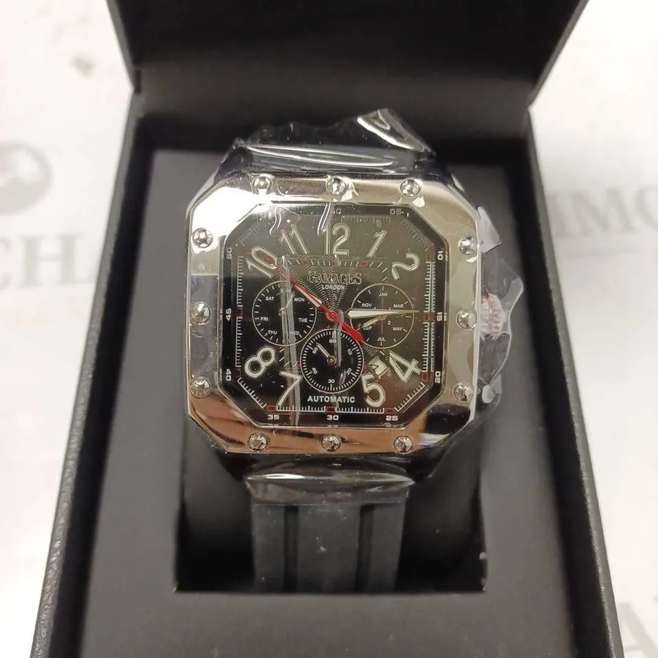 GAMAGES CONSUL STEEL BLACK TRIPLE DATE DIAL AUTOMATIC RUBBER STRAP WRISTWATCH