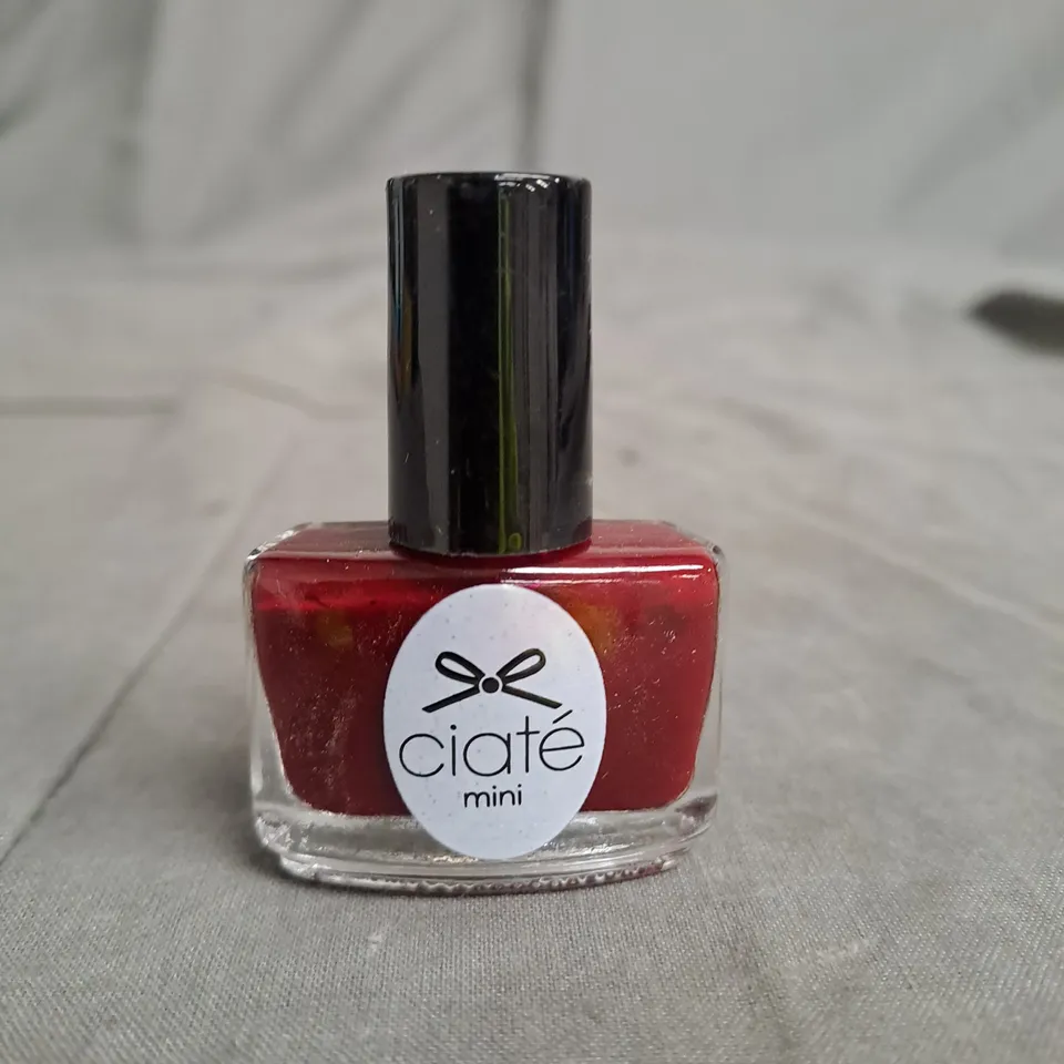 APPROXIMATELY 20 CIATE MINI NAIL POLISHES RED