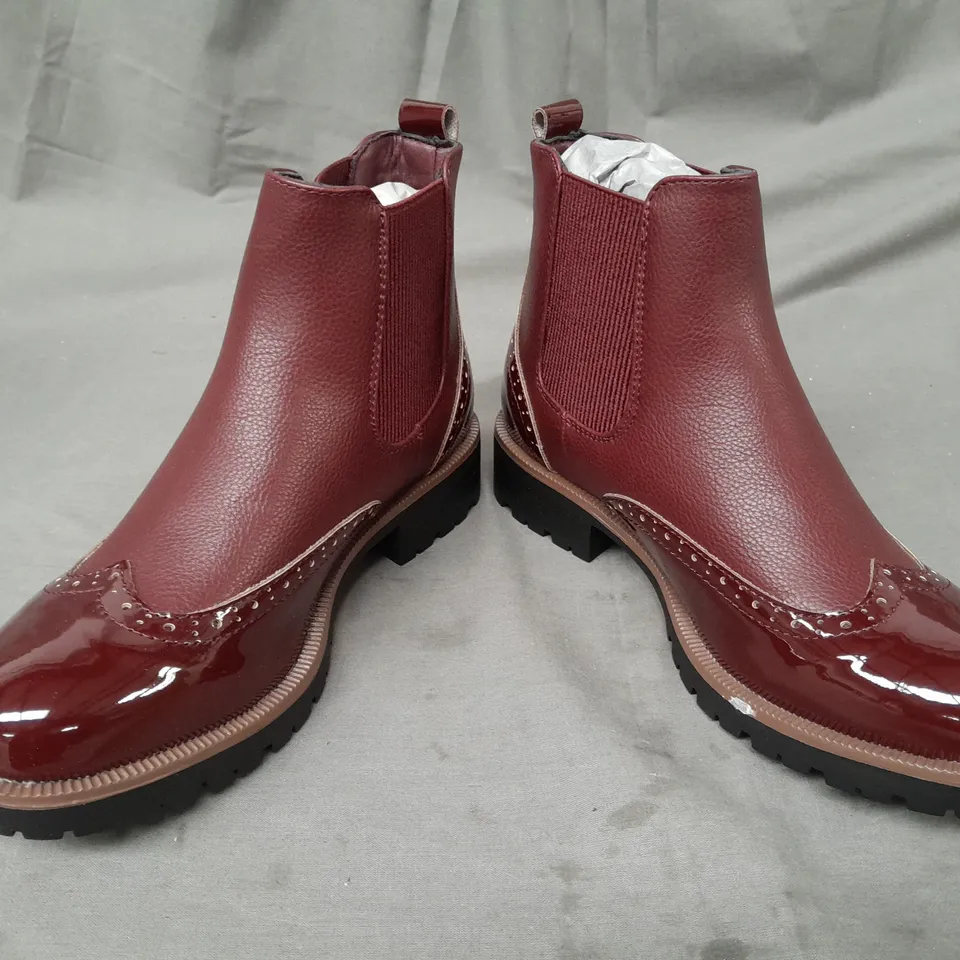 BOXED PAIR OF DESIGNER ANKLE BOOTS IN WINE RED EU SIZE 36
