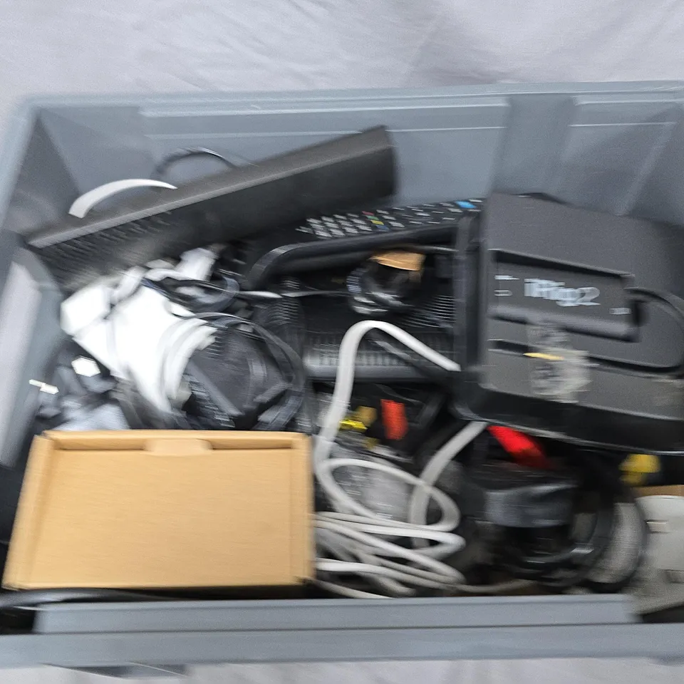 APPROXIMATELY 20 ASSORTED HOUSEHOLD ITEMS TO INCLUDE IRIG 2, REMOTE CONTROLS AND ASSORTED CABLES
