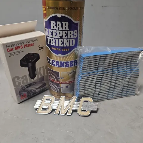 APPROXIMATELY 7 ASSORTED ITEMS TO INCLUDE - CAR MP3 PLAYER , BALANCING WEIGHTS , BAR KEEPERS FRIEND CLEANSER ETC
