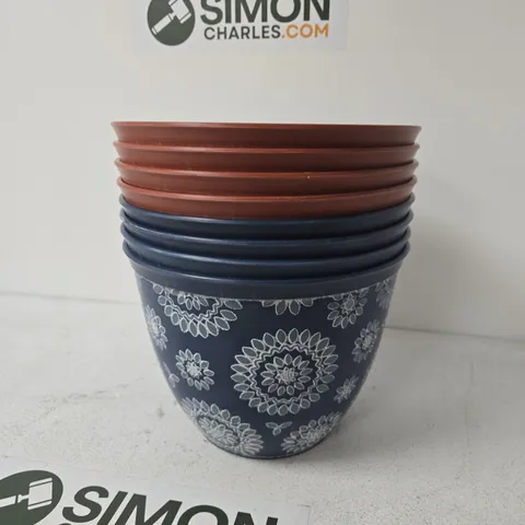 APPROXIMATELY 8 FLORAL DESIGN PLASTIC PLANT POTS