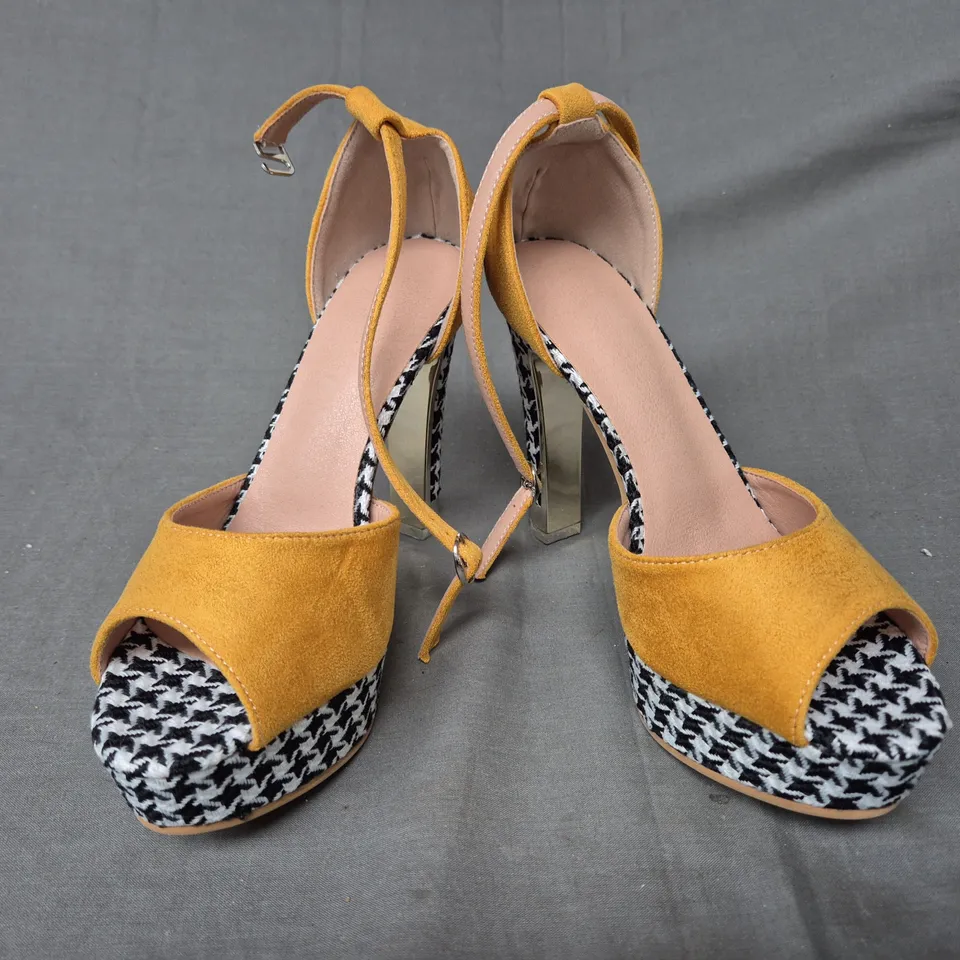 BOXED PAIR OF UNBRANDED PEEP TOE PLATFORM HIGH HEEL SANDALS IN YELLOW/BLACK & WHITE EU SIZE 38