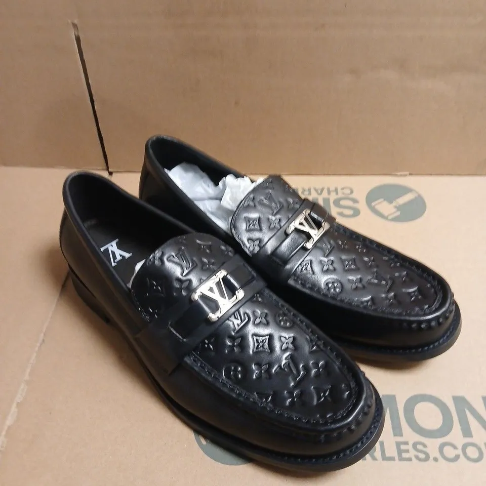 PAIR OF LOUIS VUITTON PARIS MONOGRAM LEATHER LOAFERS – 11