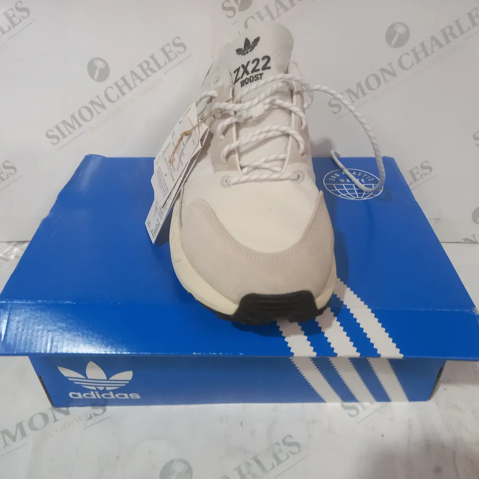 BOXED PAIR OF ADIDAS ZX 22 BOOST SHOES IN WHITE/ORANGE UK SIZE 9.5