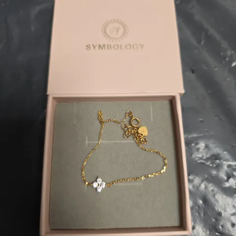 SYMBOLOLOGY GOLD-TONE BRACELET WITH CRYSTAL CLOVER PENDANT – BOXED