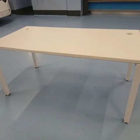 WHITE RECTANGULAR TABLE WITH CIRCULAR TOP HOLE