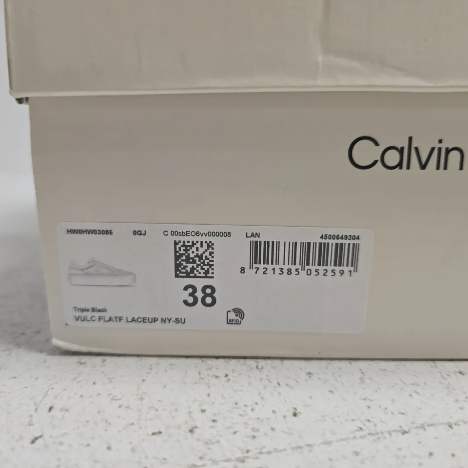 BOXED PAIR OF CALVIN KLEIN BLACK VULC FLAT LACE-UP SNEAKERS – UK5