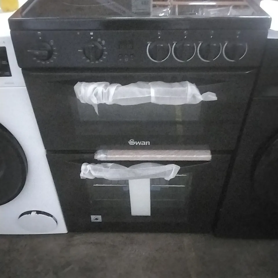 SWAN
SX16720B 60CM ELECTRIC TWIN OVEN CERAMIC HOB COOKER - BLACK