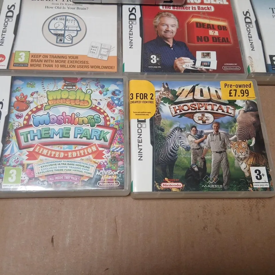 NINTENDO DS HANDHELD GAMES CONSOLE WITH FOURTEEN ASSORTED GAMES 