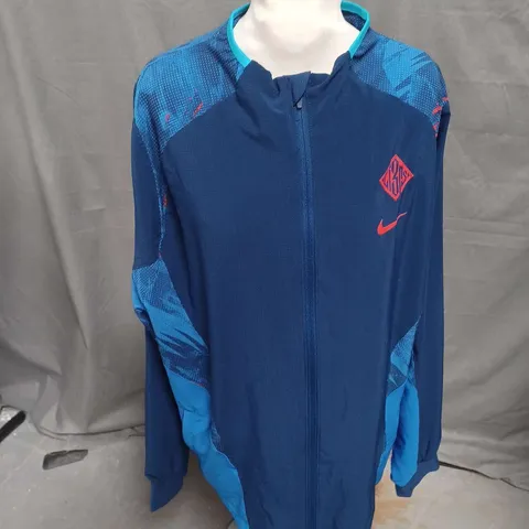 NIKE DRIFIT ZIP THROUGH TRACK JACKET IN BLUE MULTI SIZE XL