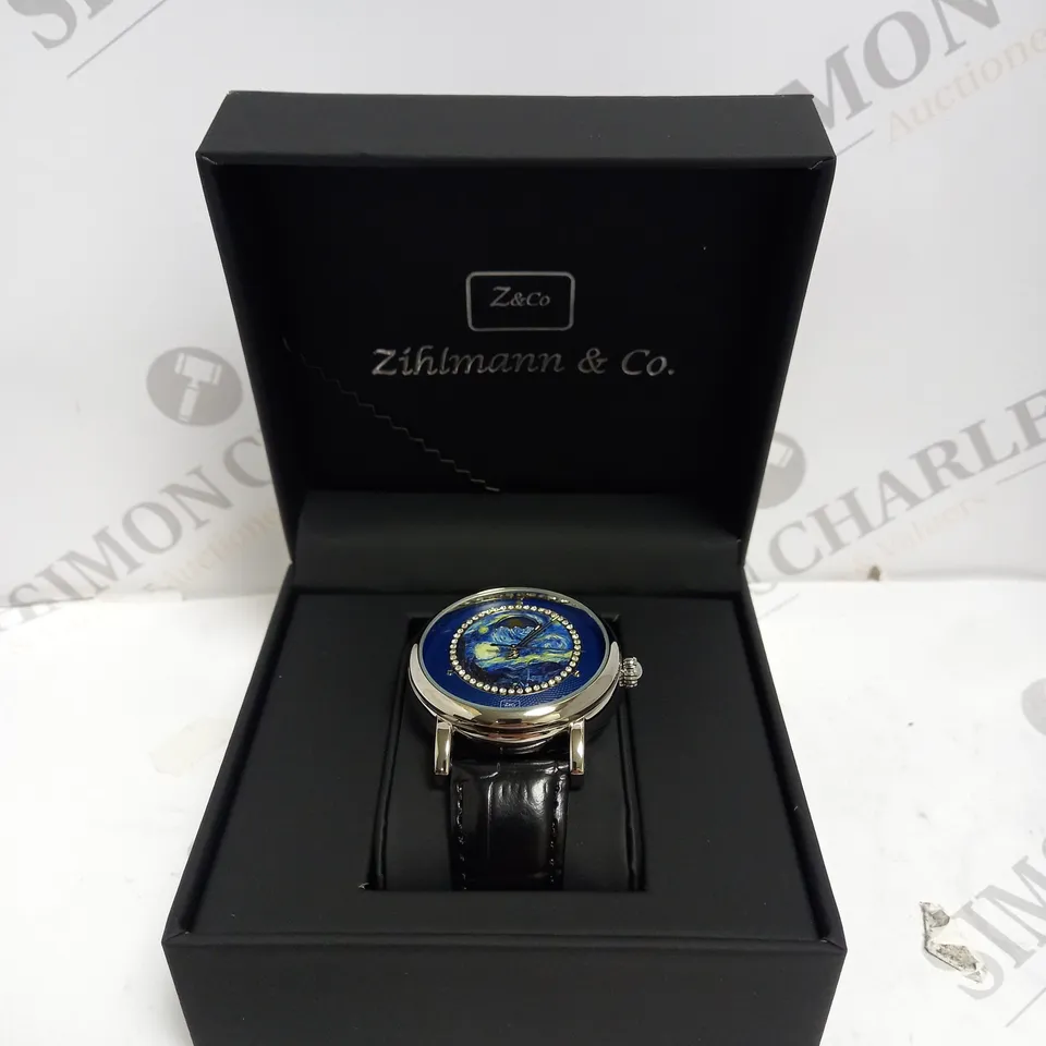 MENS ZIHLMANN & CO AUTOMATIC WATCH – Z150 – MOONPHASE DIAL – GLASS EXHIBITION BACKCASE - SILVER COLOUR CASE – BLACK LEATHER STRAP