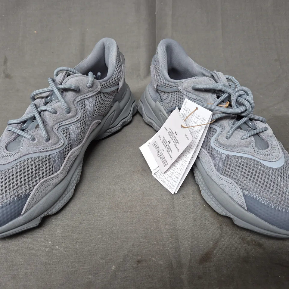 BOXED PAIR OF ADIDAS OZWEEGO SHOES IN GREY UK SIZE 7