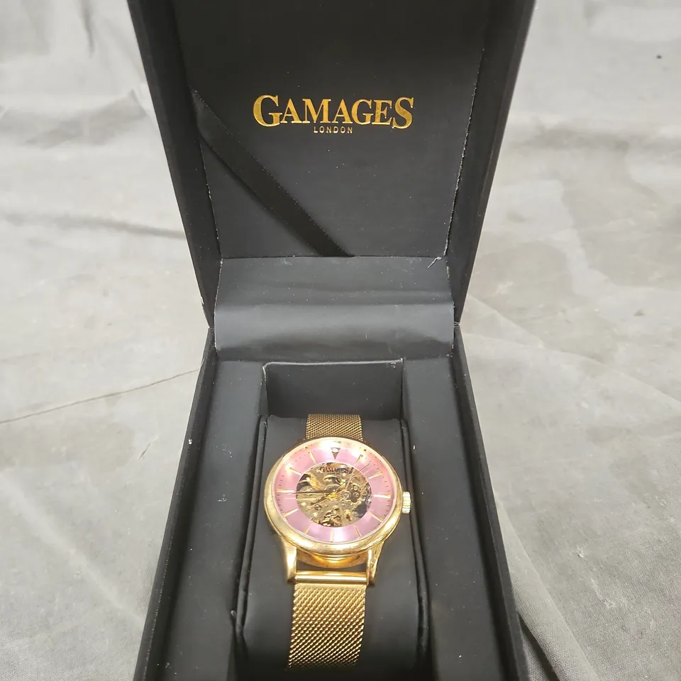 GAMAGES LONDON GOLD-TONE SKELETON WATCH WITH PINK DIAL, MESH BRACELET