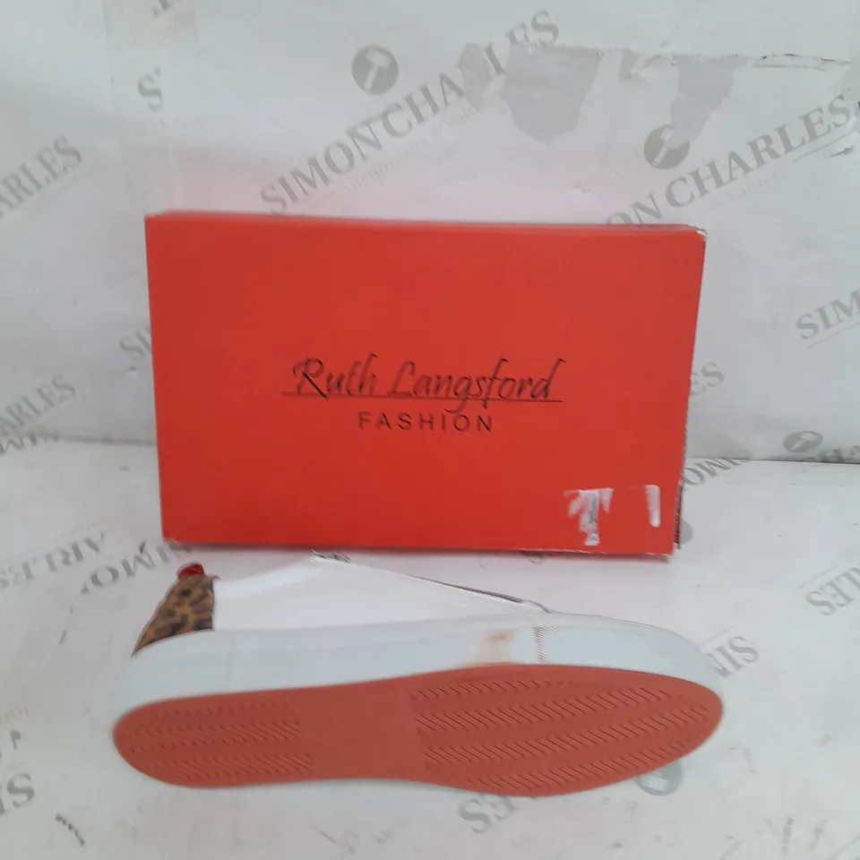 BOXED PAIR OF RUTH LANGSFORD TRAINERS IN WHITE LEOPARD PRINT SIZE 8