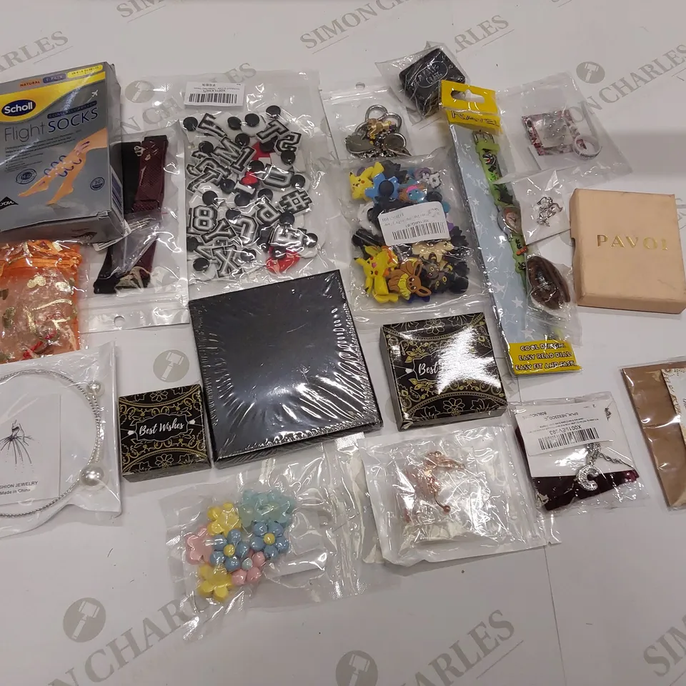 20 BRAND NEW ITEMS TO INCLUDE: FLIGHT SOCKS, WATCH STRAPS, PAVOI