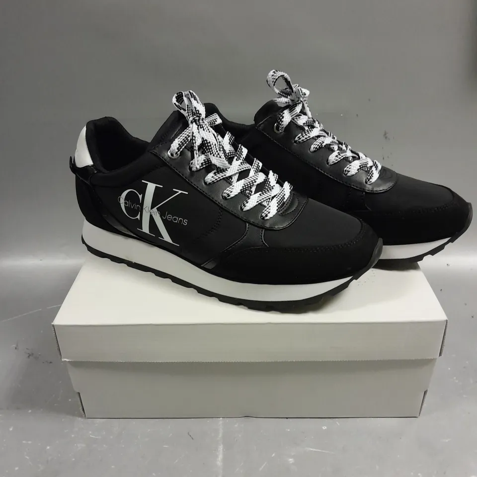BOXED PAIR OF CALVIN KLEIN CAYLE BLACK FABRIC TRAINERS - 8