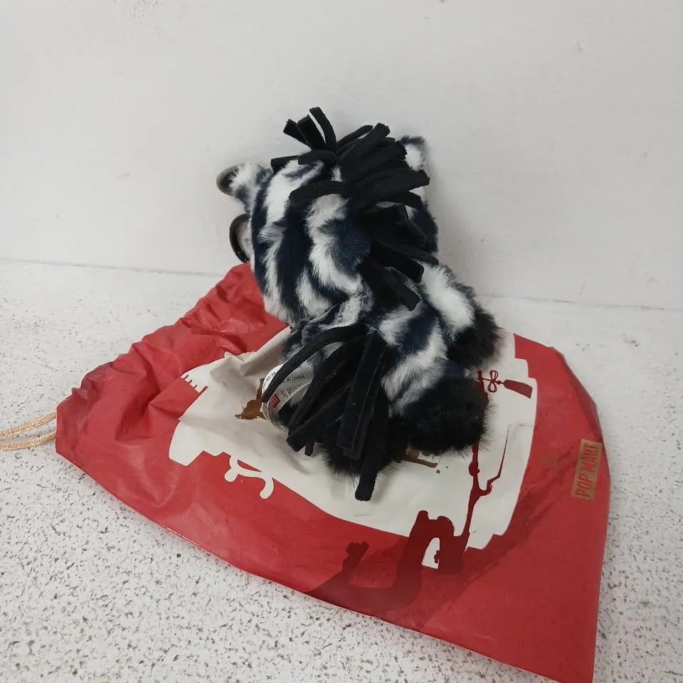 POP MART PLUSH TOY - BLACK & WHITE FAUX WITH BLUE EYES, RED DRAWSTRING BAG