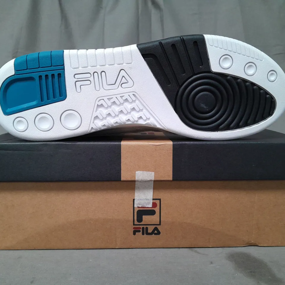 BOXED PAIR OF FILA SHOES IN WHITE UK SIZE 11