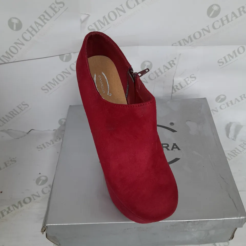 BOXED PAIR OF CASSANDRA PLATFORM SHOE IN RED SUEDE WITH GOLD SPIKES SIZE 6