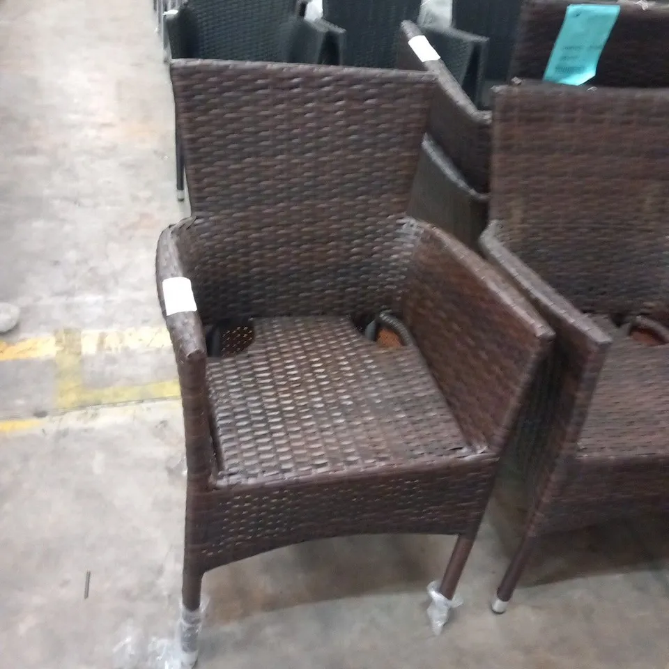 FOUR RATTAN EFFECT STACKING GARDEN CHAIRS
