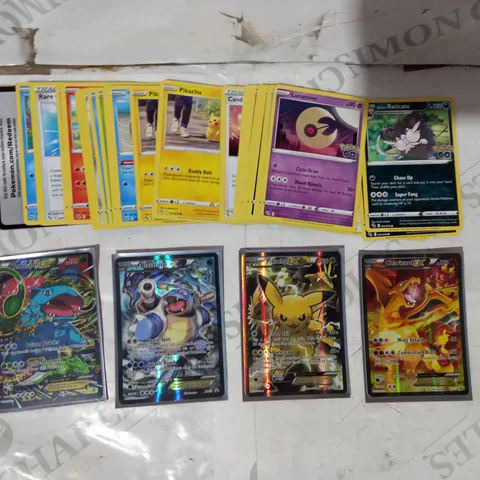 LOT OF ASSORTED POKΓMON TRADING CARDS