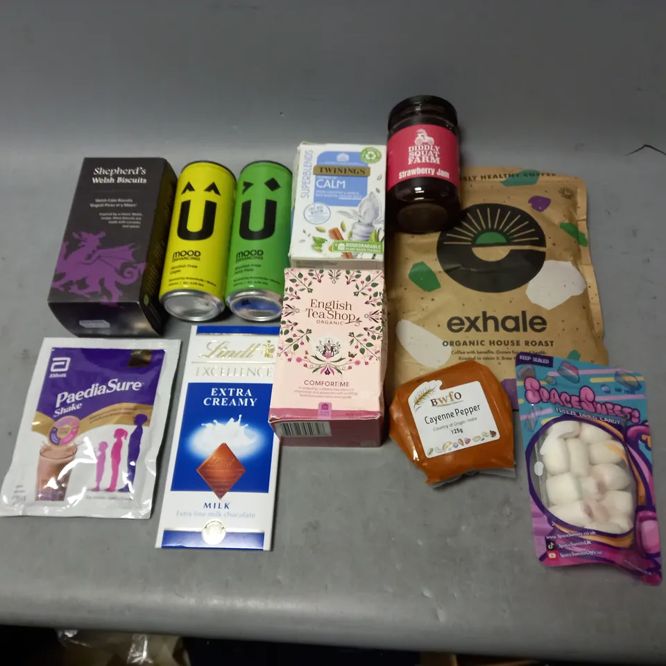 LOT OF APPROXMATELY 8 ITEMS TO INCLUDE  - LINDT MILK, EXHALE HOUSE ROAST, AND TWINNING CALM ETC. 