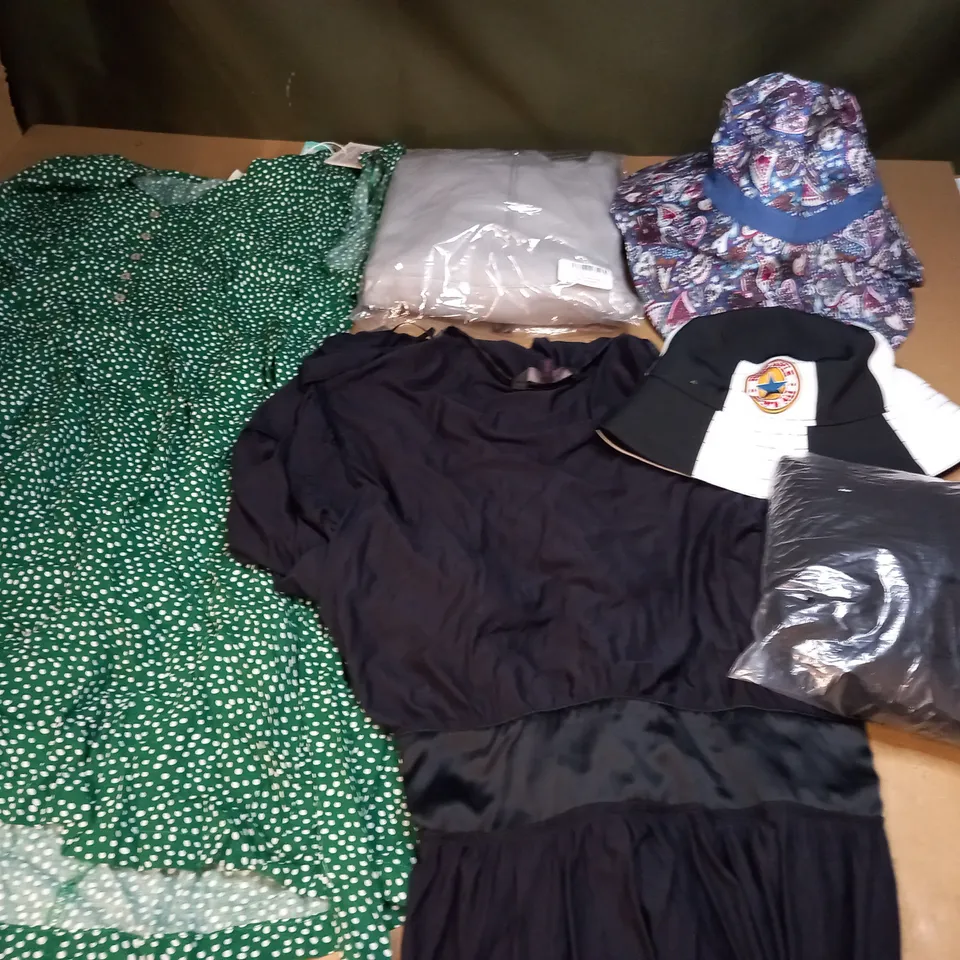 LARGE QUANTITY OF ASSORTED CLOTHING ITEMS TO INCLUDE - DRESSES, T-SHIRTS AND TROUSERS