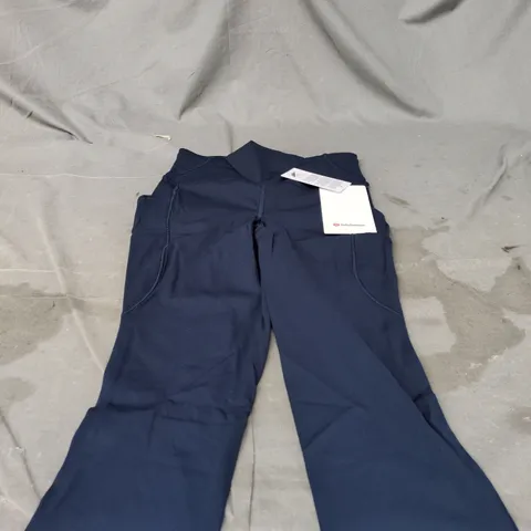 LULULEMON FAST AND FREE HR TIGHT 25" LENGTH WITH POCKETS SIZE 4