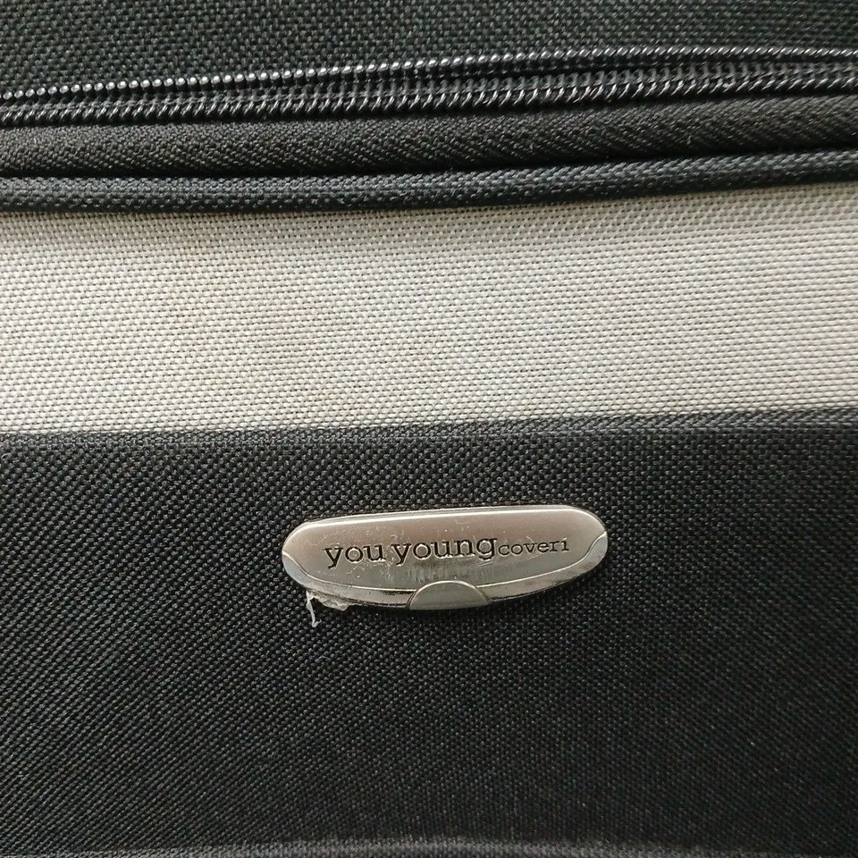 BLACK SOFT-SHELL WHEELED LUGGAGE CASE WITH FRONT POCKET (BADGE READS 'YOU YOUNG COVERI')