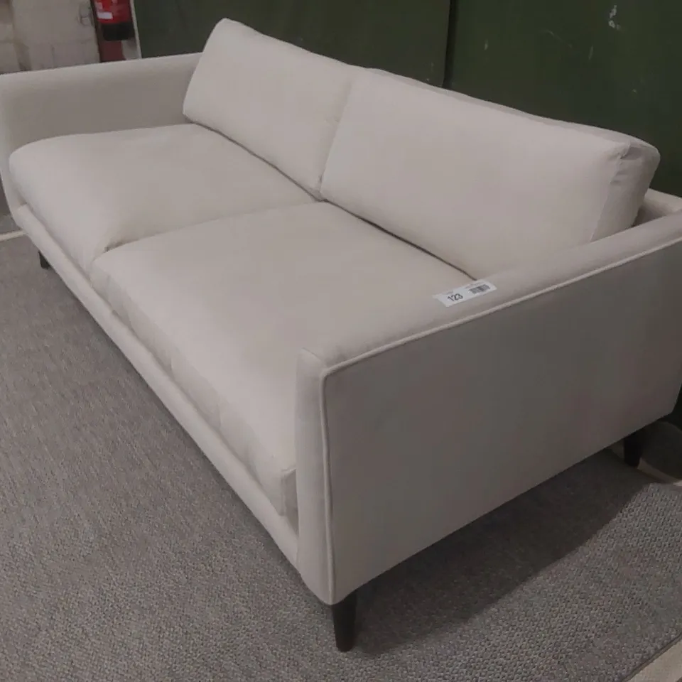 QUALITY EX-SHOWROOM THREE SEATER SOFA UPHOLSTERED IN SOFT OFF-WHITE FABRIC 