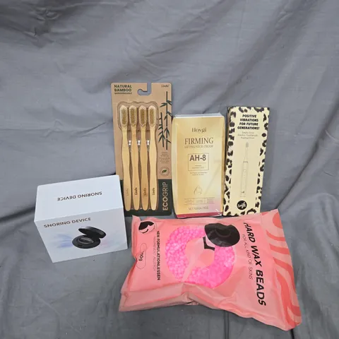 APPROXIMATELY 9 ASSORTED HEALTH AND BEAUTY ITEMS TO INCLUDE BAMBOO TOOTHBRUSHES, SNORING DEVICE, HAND WAX BEADS, ETC