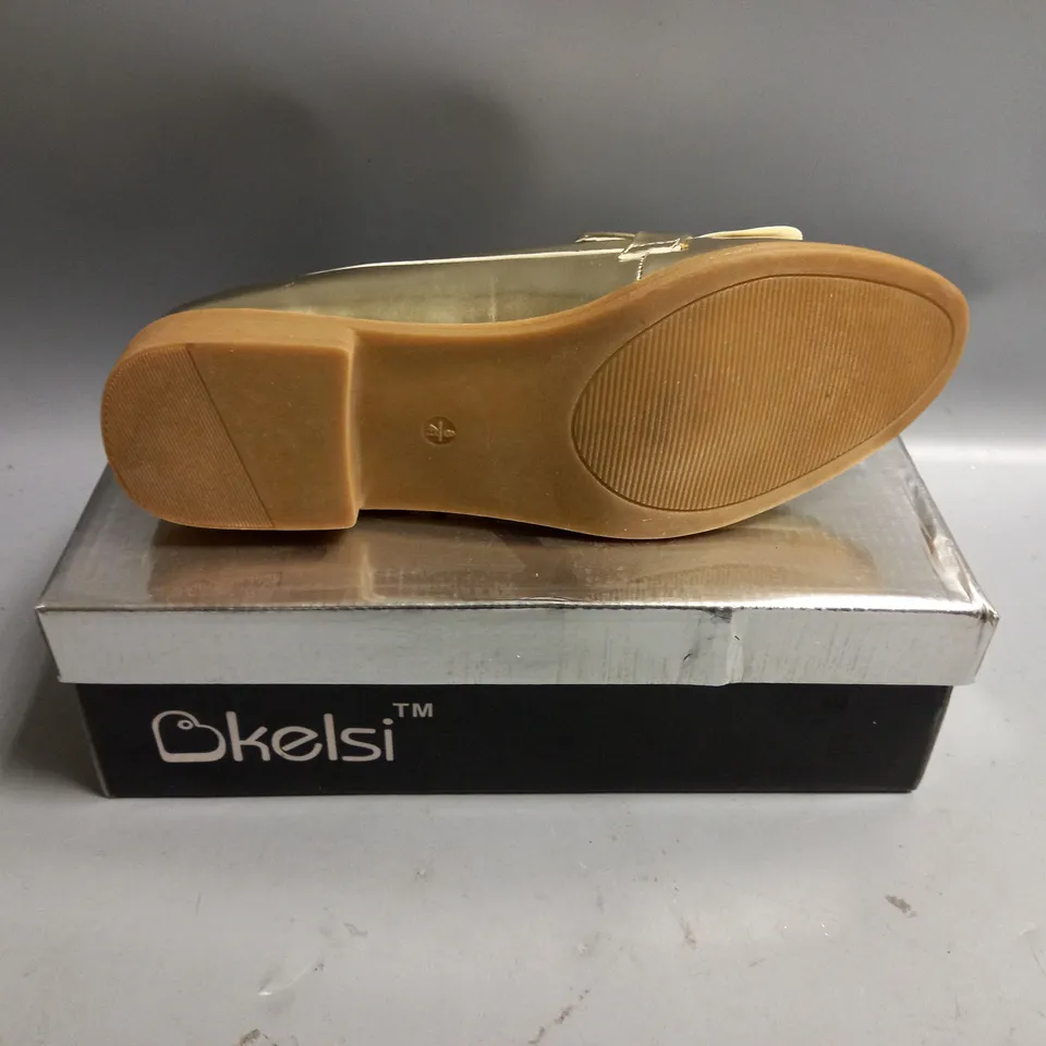 BOXED KELSI LADIES FLAT GOLD BROGUES. SIZE 8