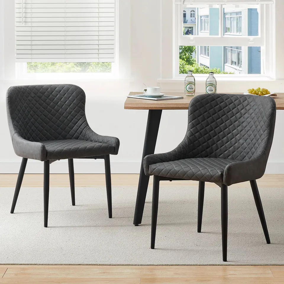 BOX CONTAINING PAIR OF GREY FAUX LEATHER UPHOLSTERED SIDE/DINING CHAIRS