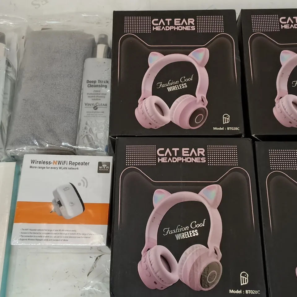 LOT OF 12 ASSORTED ITEMS TO INCLUDE CAT EAR HEADPHONES, WIFI REPEATER AND VINYL CLEANING KITS