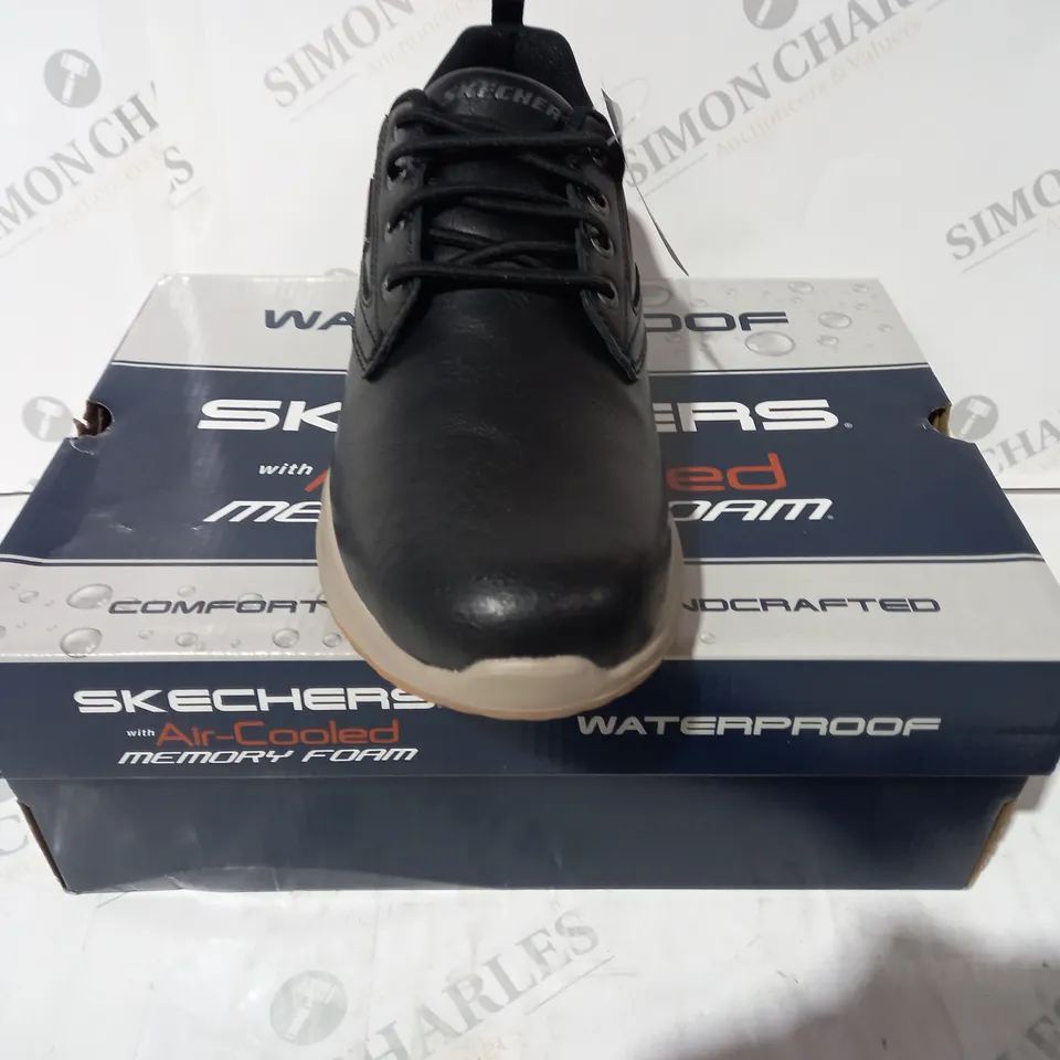 BOXED PAIR OF SKECHERS WATERPROOF SHOES IN BLACK UK SIZE 8