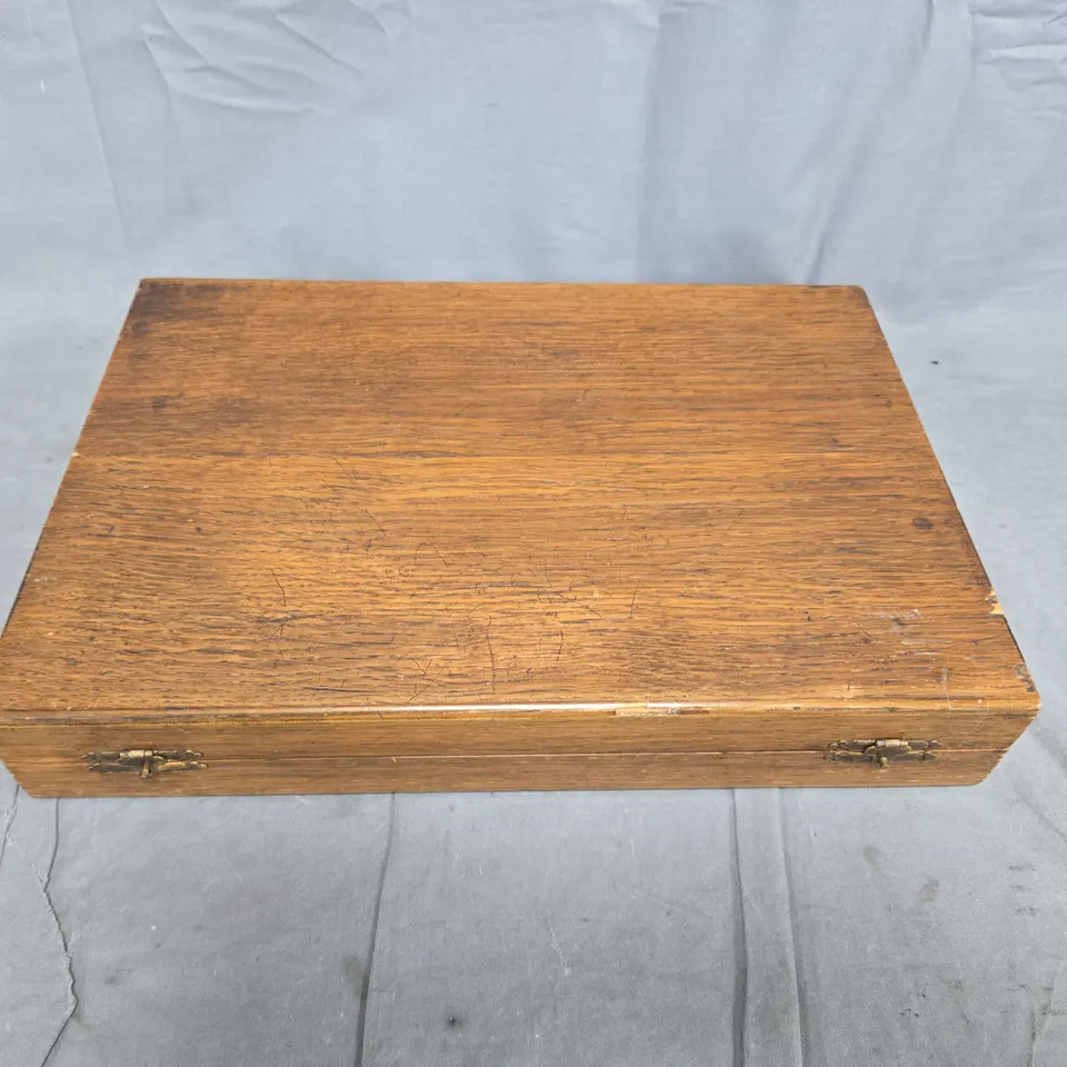 VINTAGE CUTLERY SET IN WOODEN BOX WITH CREAM HANDLES AND BLUE VELVET INTERIOR 